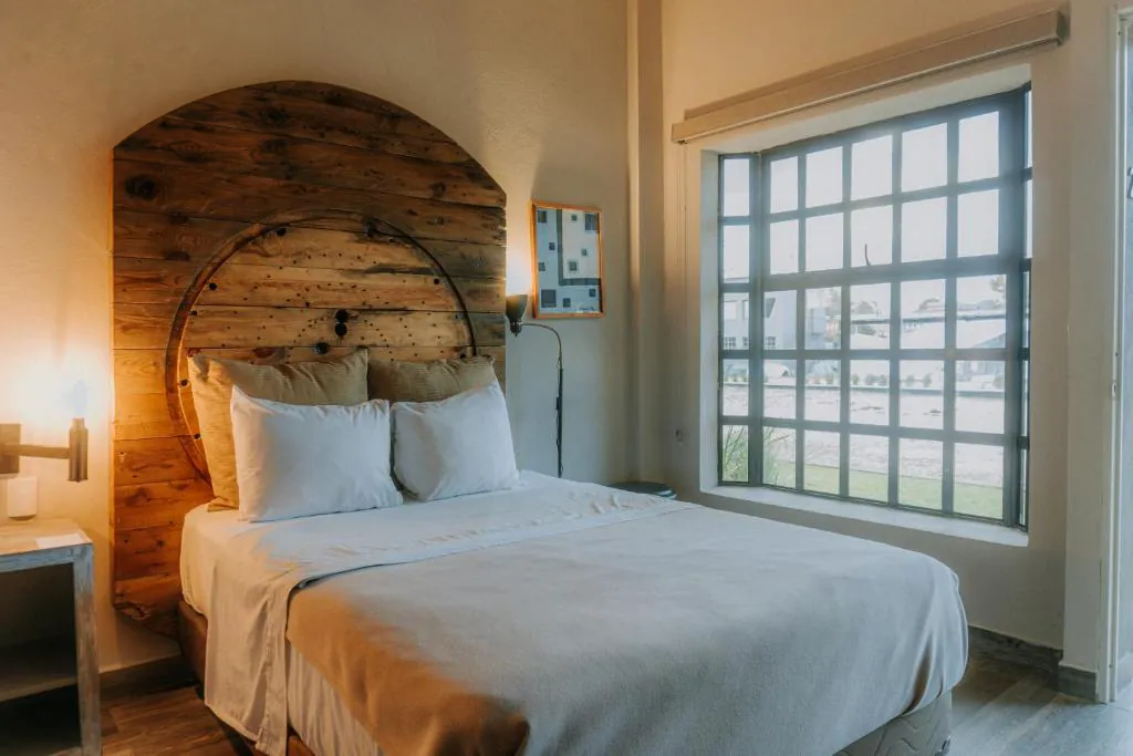 Hotel Rocaval room beside a large window